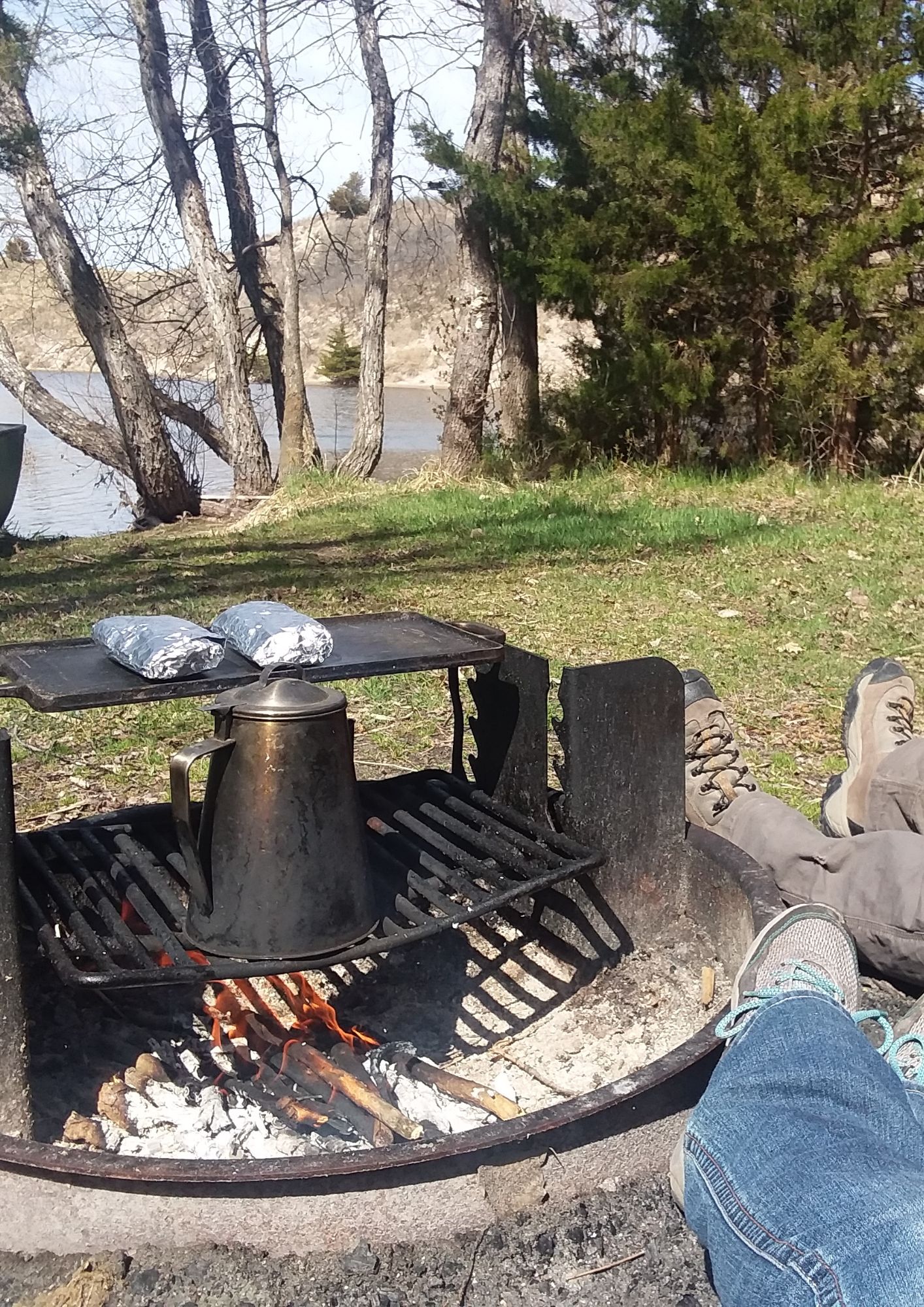 Nutritional burritos cooking over a campfire