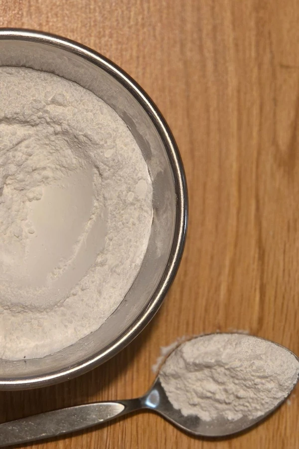 Homemade Baking Powder stored in mason jar for long term storage.