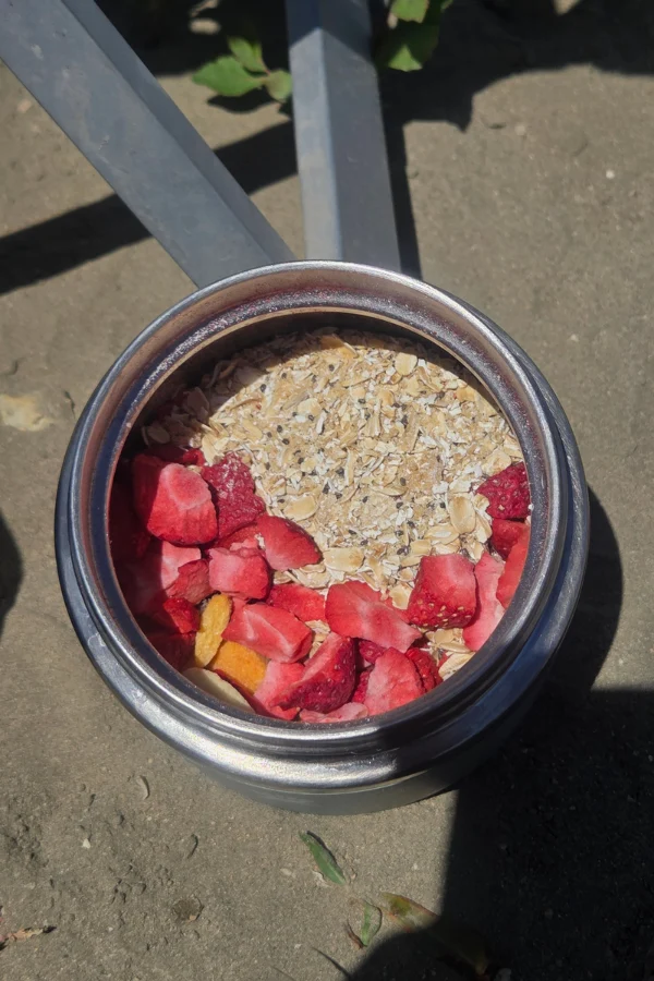 freeze dried strawberries and oats in camping thermos for on the road breakfast