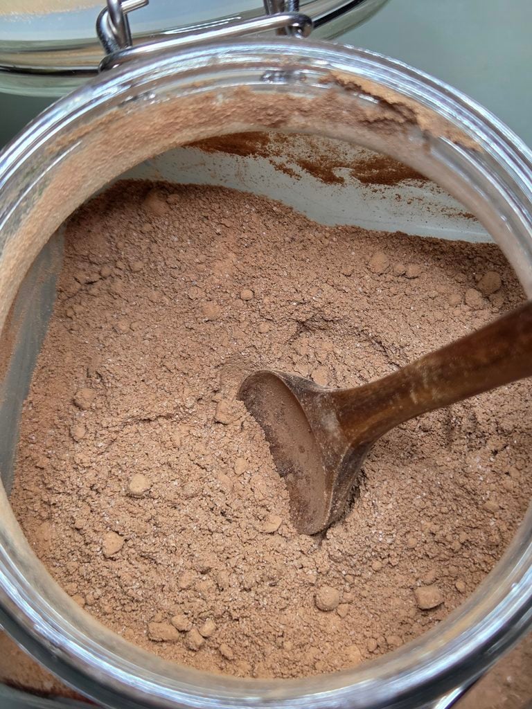 Homemade hot cocoa mix in an airtight glass container